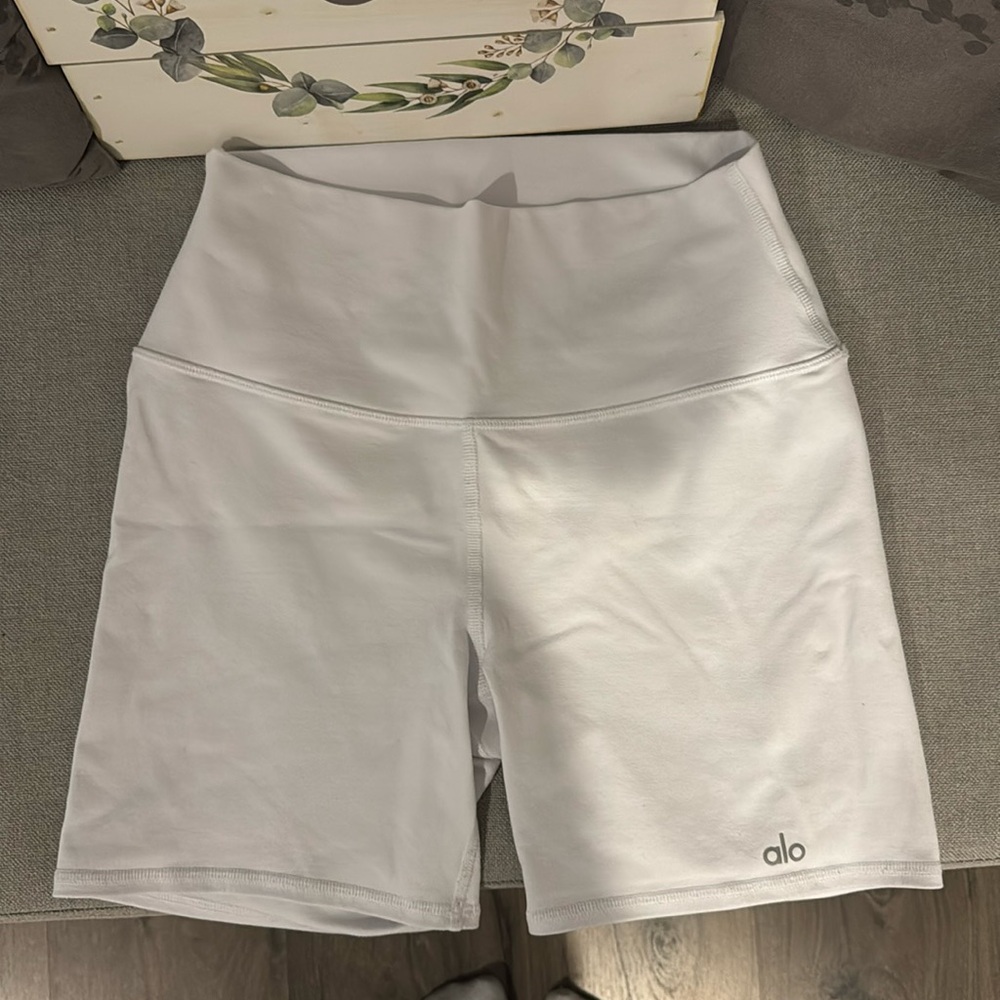 white Alo biker shorts, size M